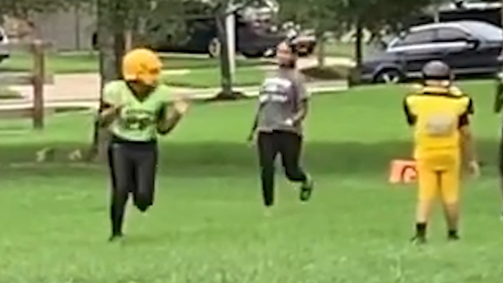 Mom caught on camera going after 12-year-old football player