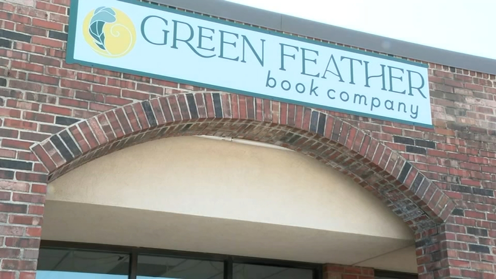 Oklahoma bookstore challenging state banned books with t-shirts, merchandise linking to open copies