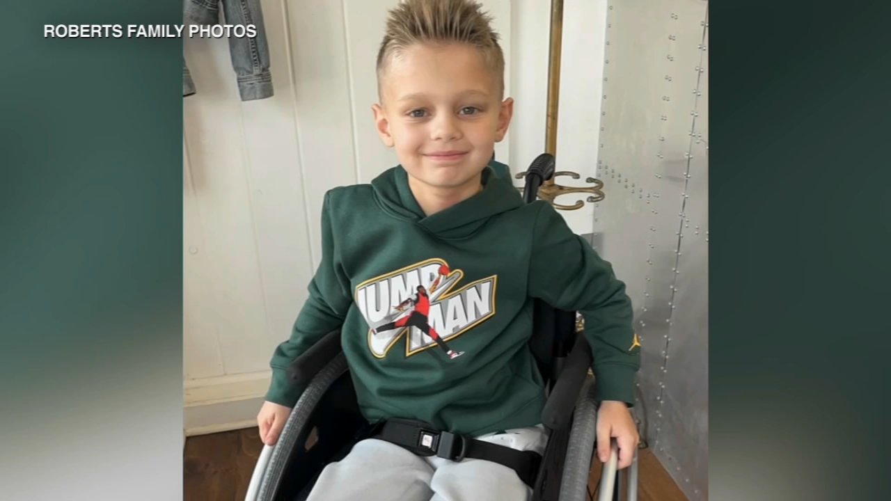 Boy paralyzed in Highland Park shooting reunites with family at home