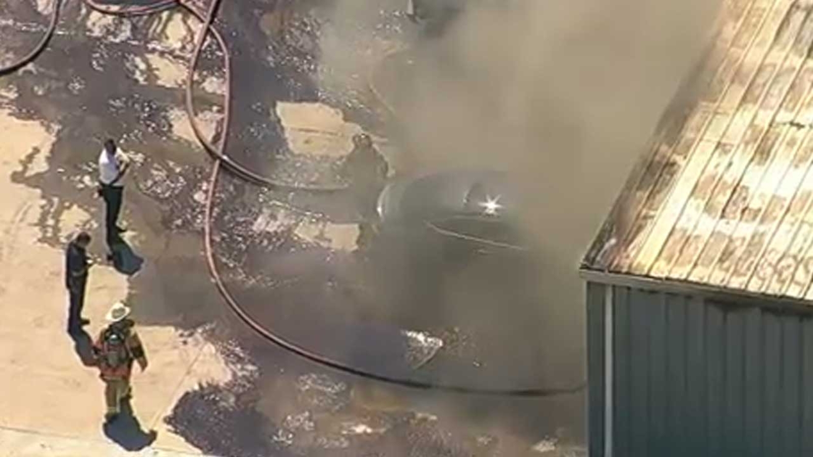 Heavy smoke seen miles away coming from building fire in southwest