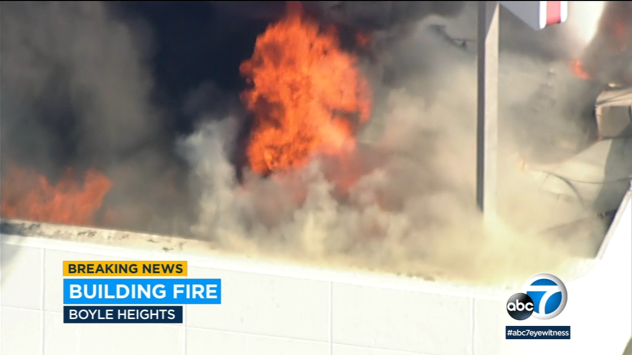 Massive fire breaks out at former bank building in Boyle Heights