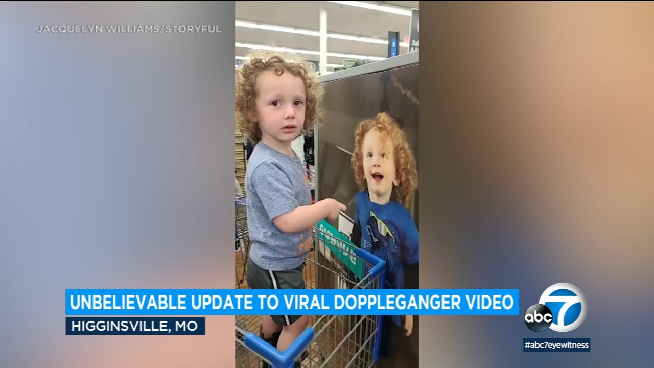 Boy stares in amazement after spotting doppelganger in ad - Video
