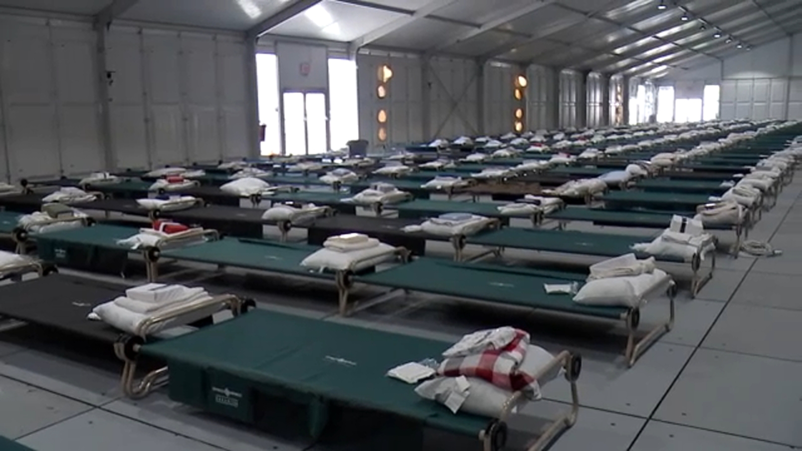 Migrant crisis NYC Emergency relief center on Randalls Island opens to
