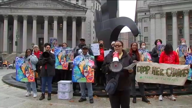 Supporters rally for domestic violence survivor facing murder charges