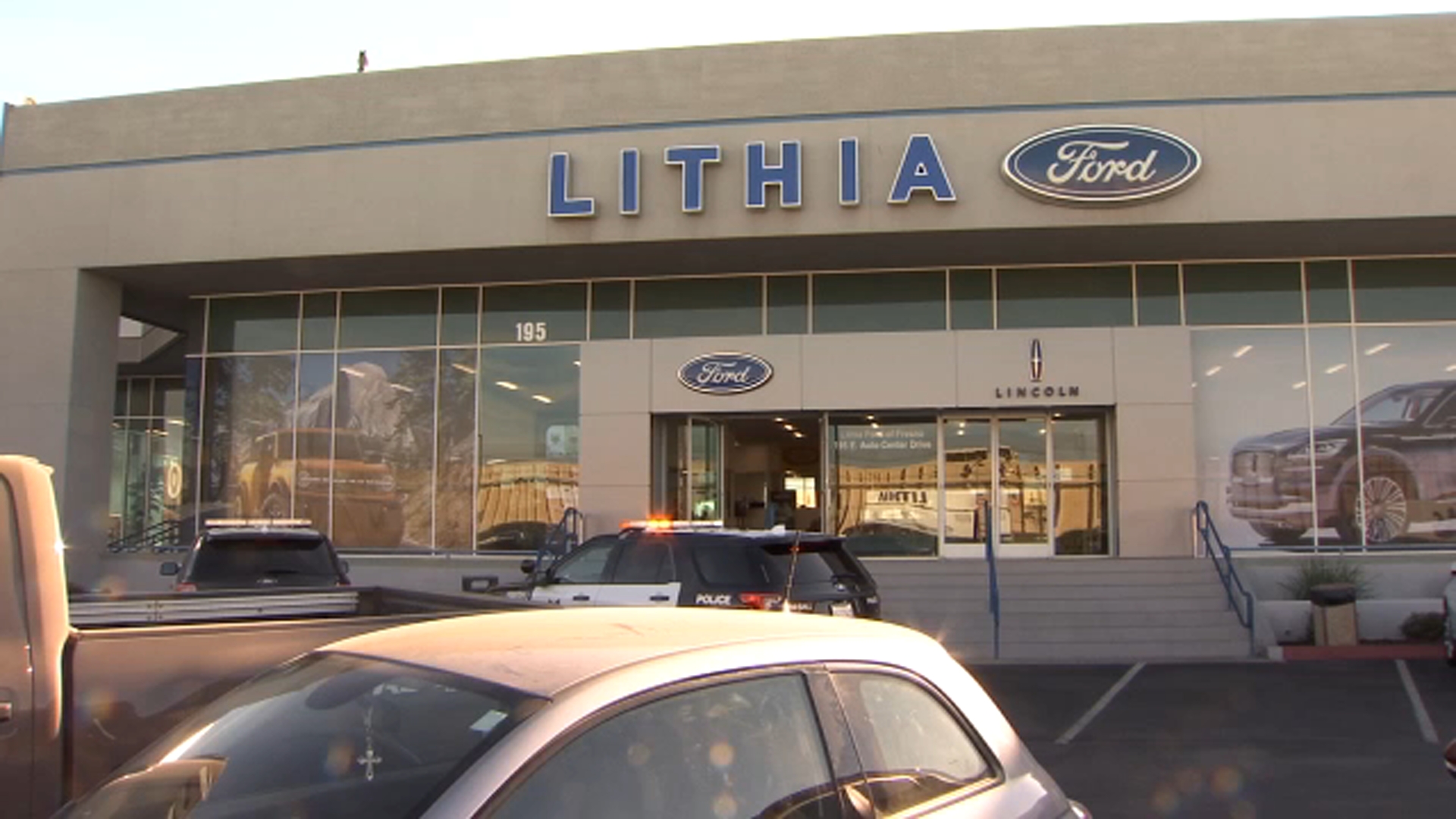 Man stabbed at Lithia Ford dealership, suspect in custody: PD