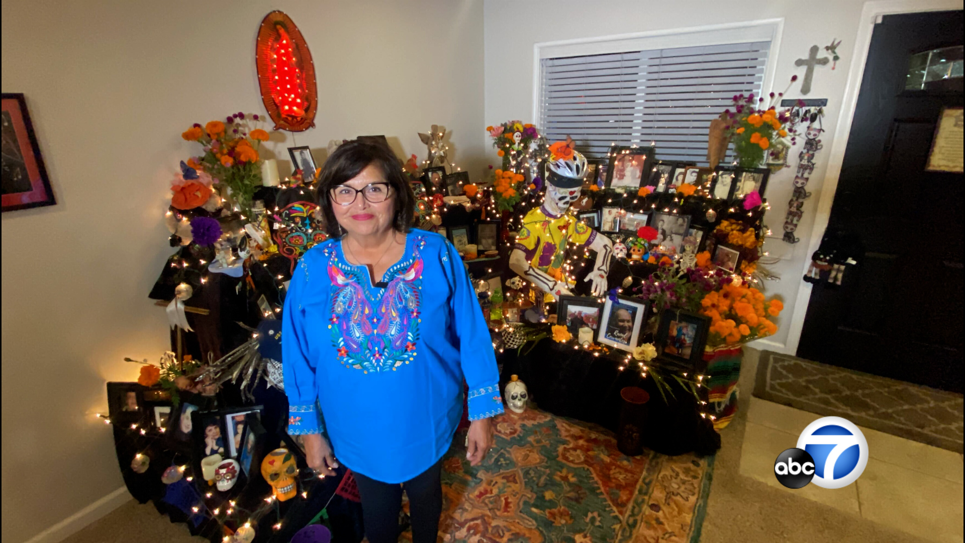 This Dia De Los Muertos altar takes over an entire living room