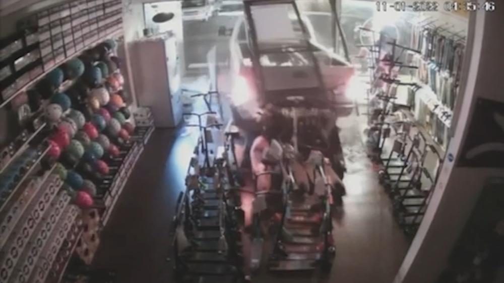 Robbers smash truck through storefront to steal scooters in OC