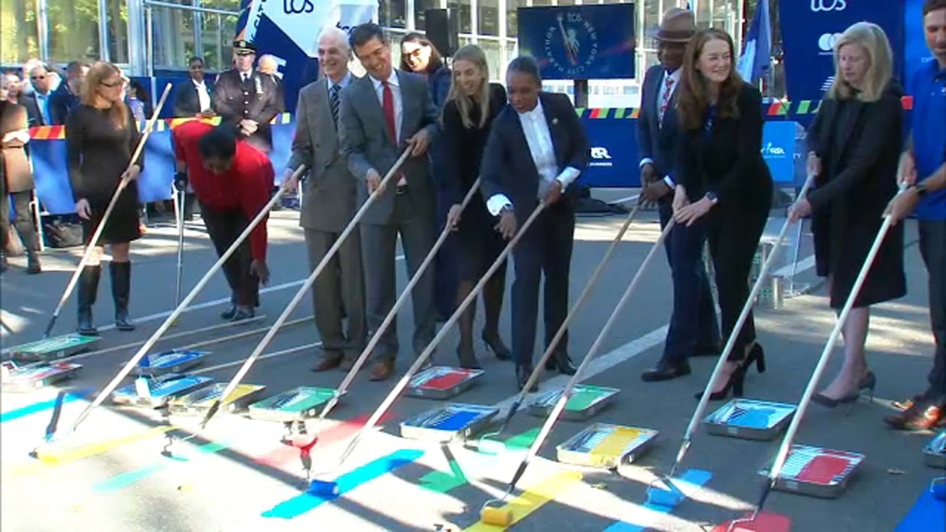 TCS NYC Marathon kicks off with Blue Line painting