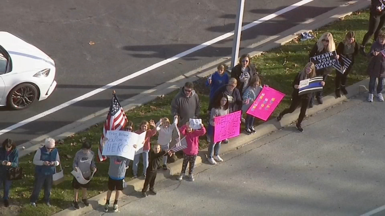 Officer shot in line of duty welcomed home nearly 1 year later