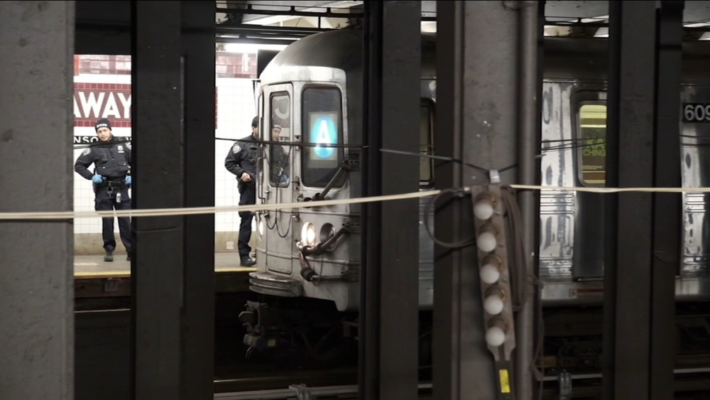 Woman saved from NYC subway tracks after being pushed