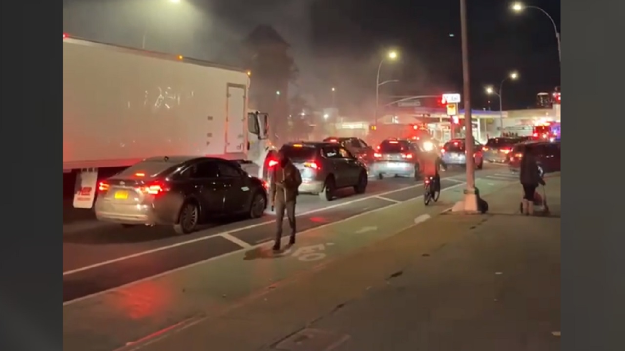 Cab catches fire at gas station in Queens