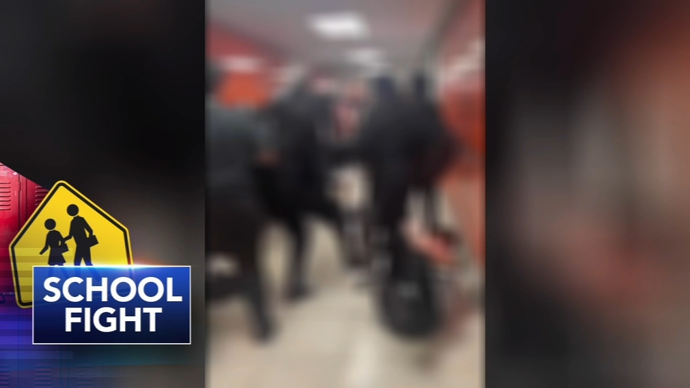 Teacher injured breaking up school fight, student arrested
