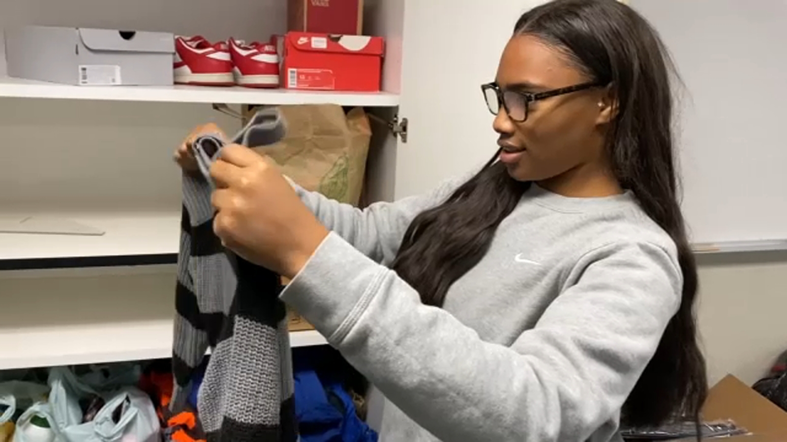 Central East High School student collecting clothes for fellow students