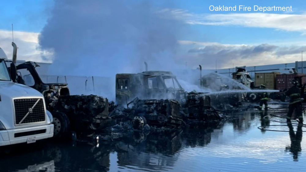 8 big rigs caught fire in Oakland, firefighters say