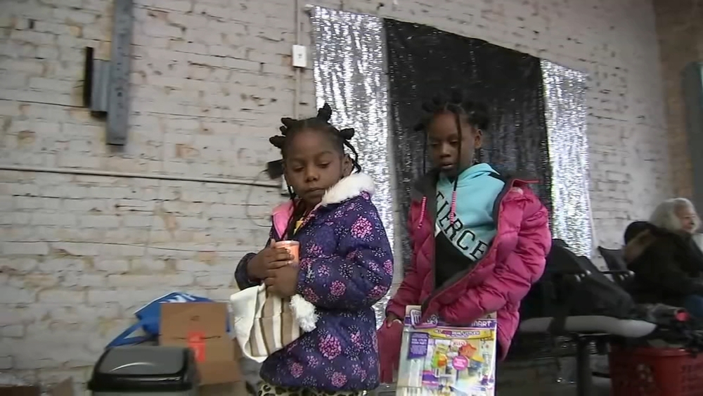 Former gang member, shooting survivor hosts South Side toy giveaway