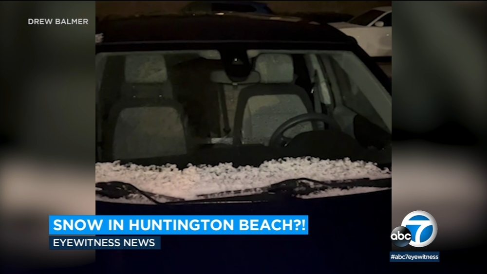 SoCal storm brings unusual sight of snow to Huntington Beach