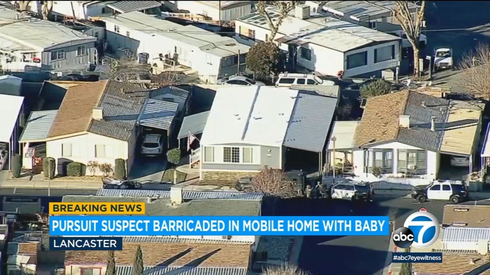 Man barricaded in Lancaster home with baby following police chase