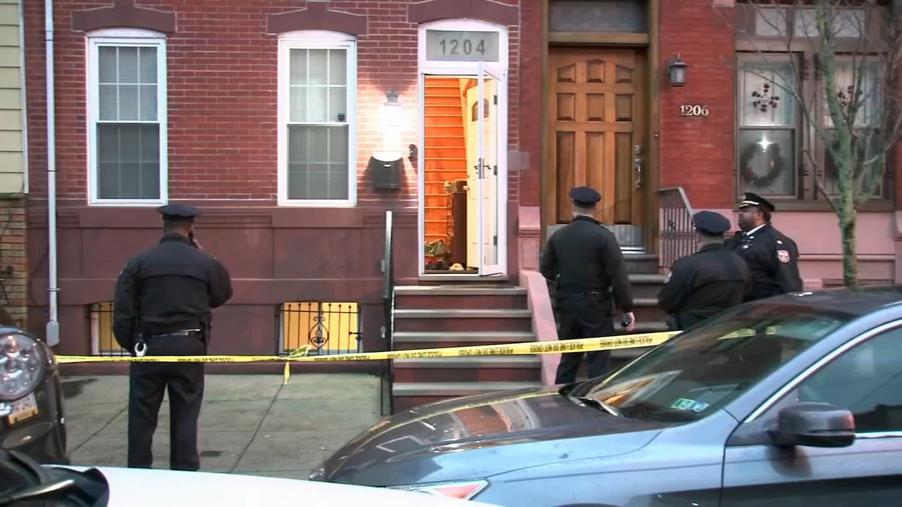 Person of interest in custody after body found in freezer