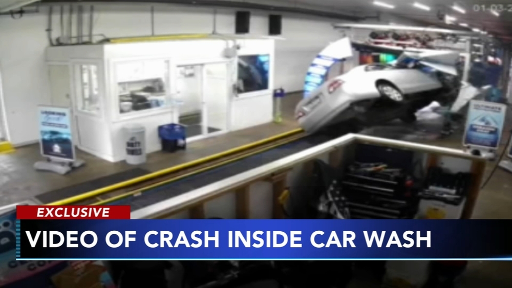 Video captures moment driver crashes, flips inside car wash