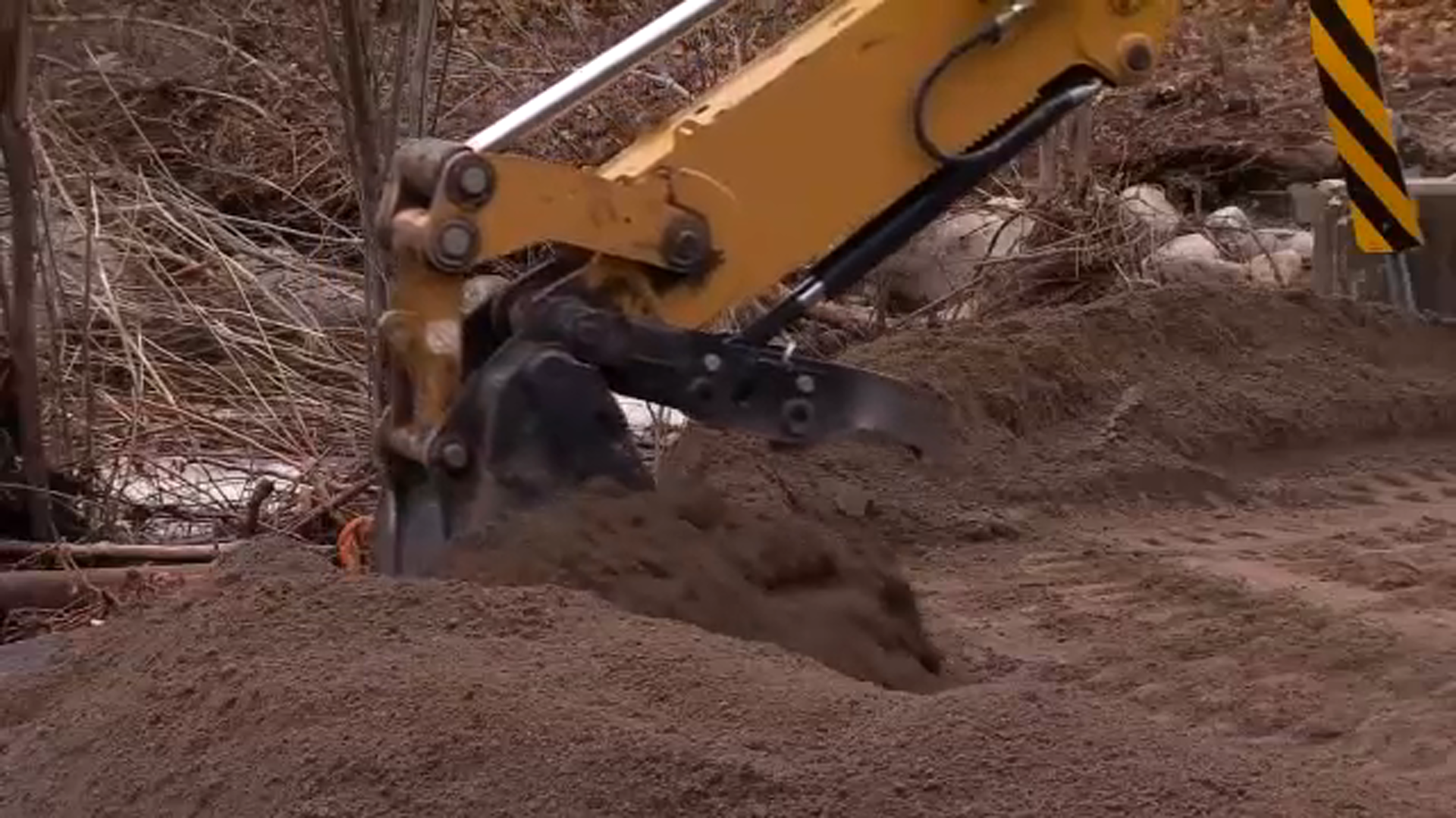 Crews clean up debris blocking bridges in Three Rivers after storm