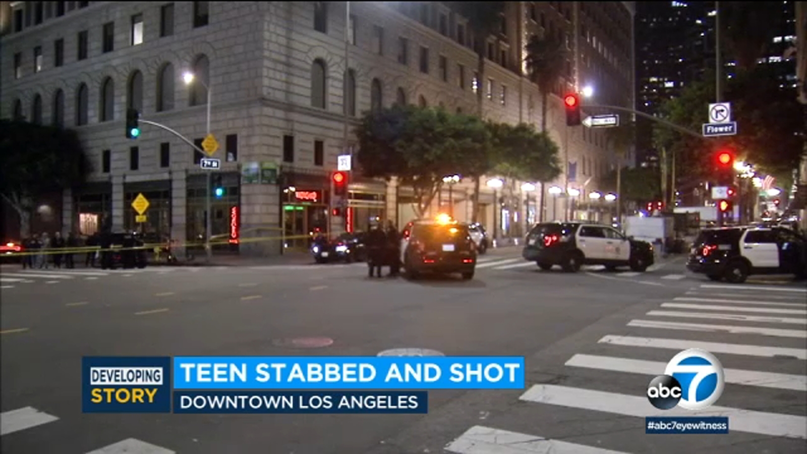 Person in handcuffs slips away from scene of shooting, stabbing in