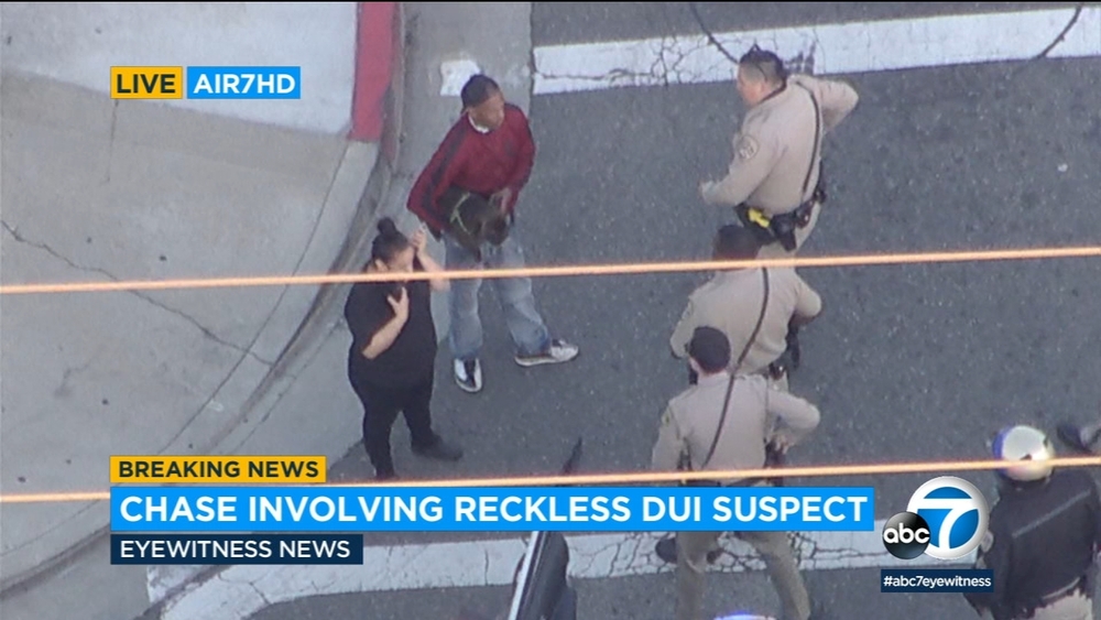 Chase on 405 Freeway ends with man, woman surrendering to CHP