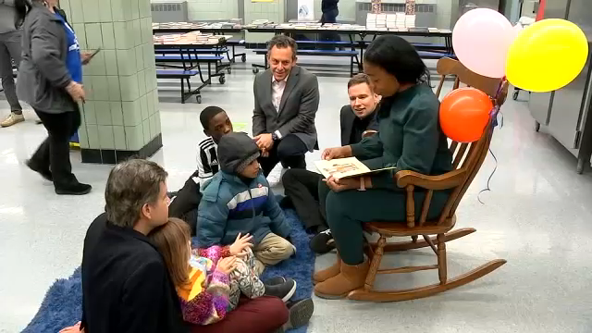 Book giveaway for migrants at P.S. 33 in Manhattan