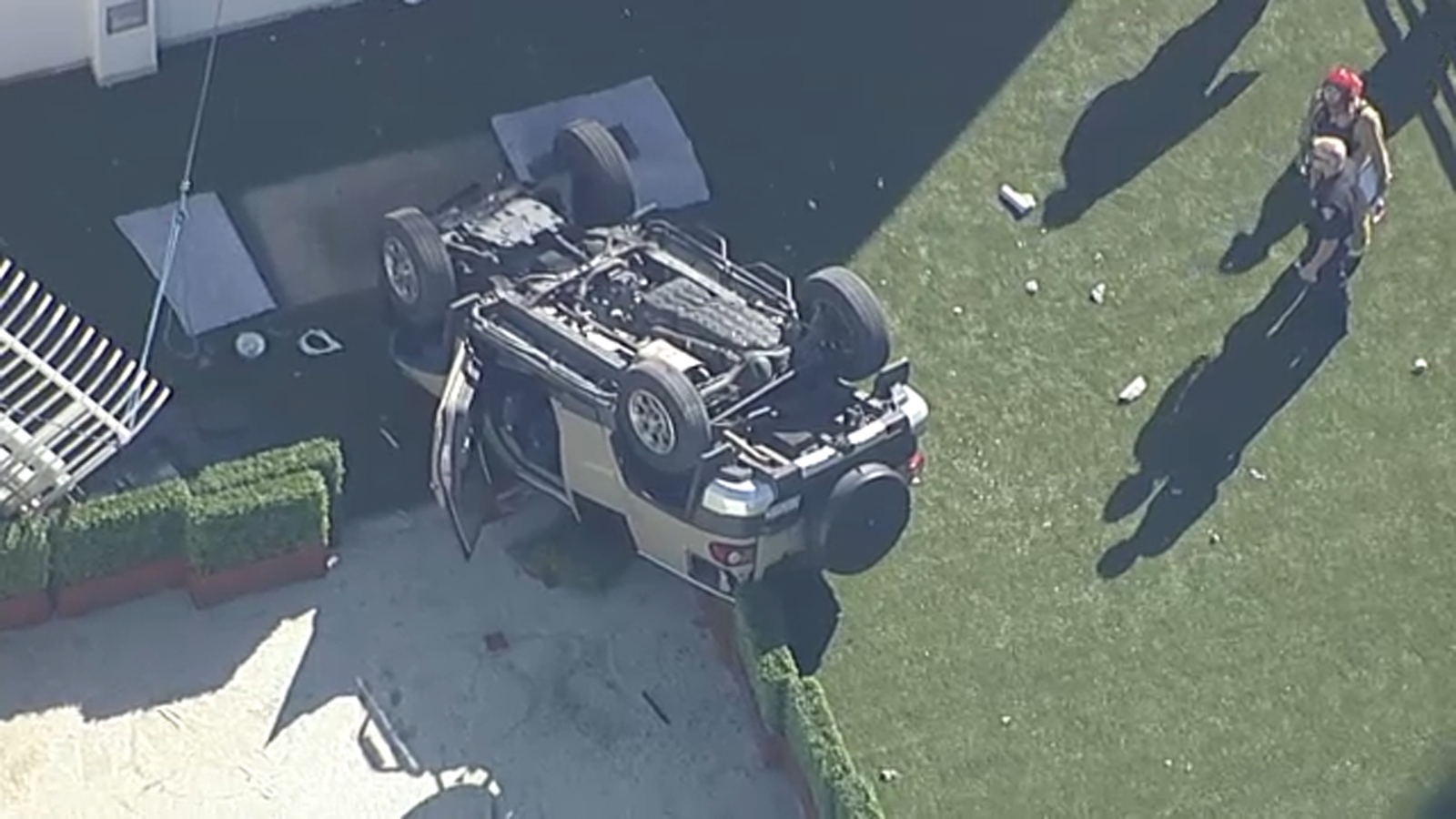 SUV falls from parking structure at hospital in Orange, lands upside down on roof of nearby
