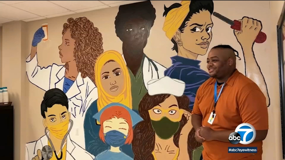 Lancaster custodian with passion for art creates diversity mural