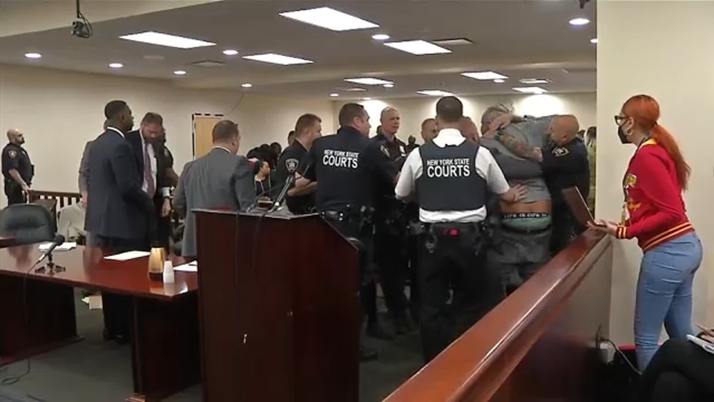Man lunges at Buffalo supermarket gunman during sentencing