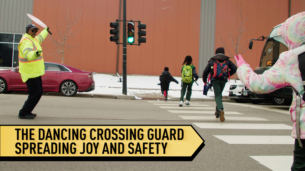 Dancing crossing guard stops traffic and spreads joy