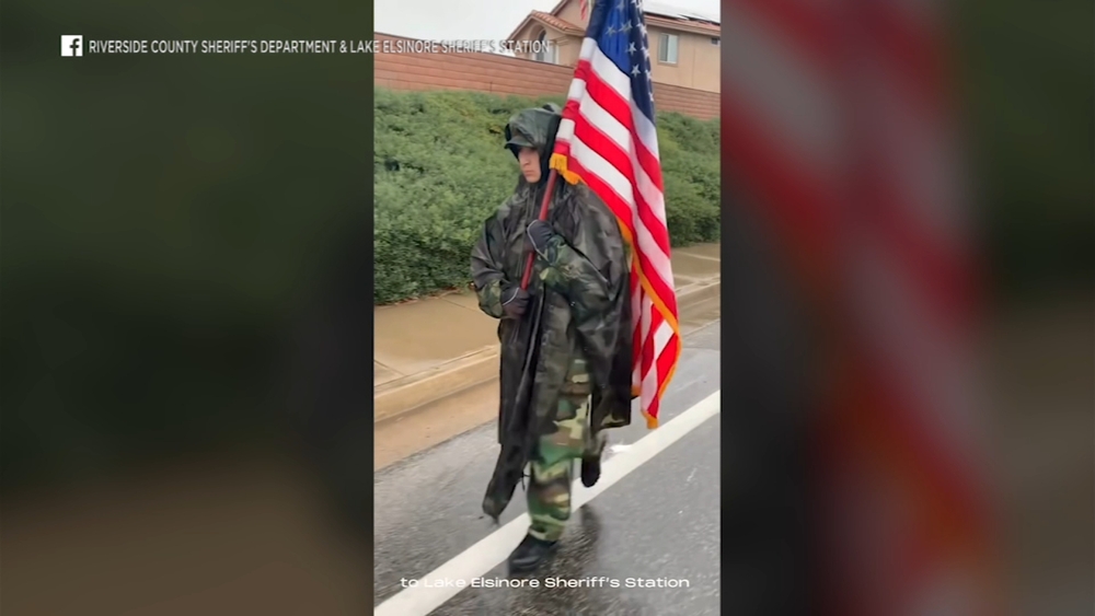 Teenager walks 12 miles in rain to honor fallen sheriff's deputy