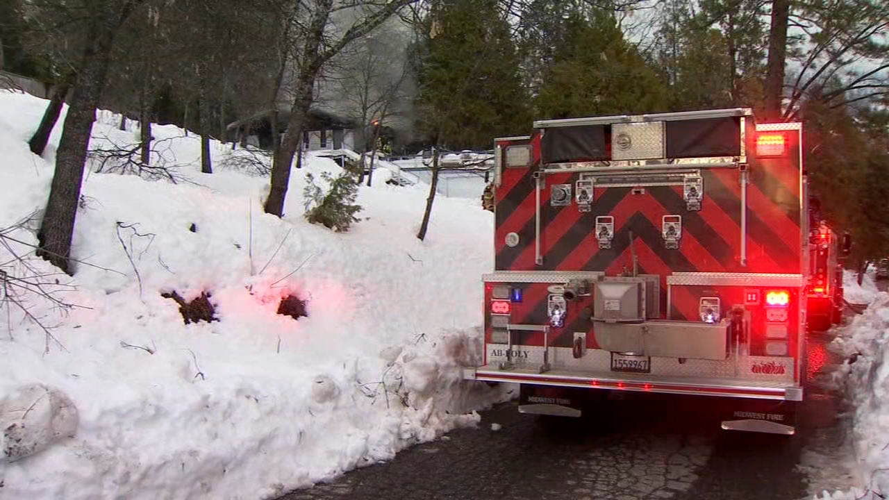 Home catches fire in snow-covered neighborhood in North Fork