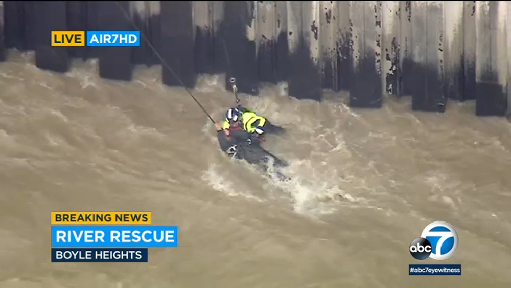 Crews rescue man from rain-swollen LA River in Boyle Heights