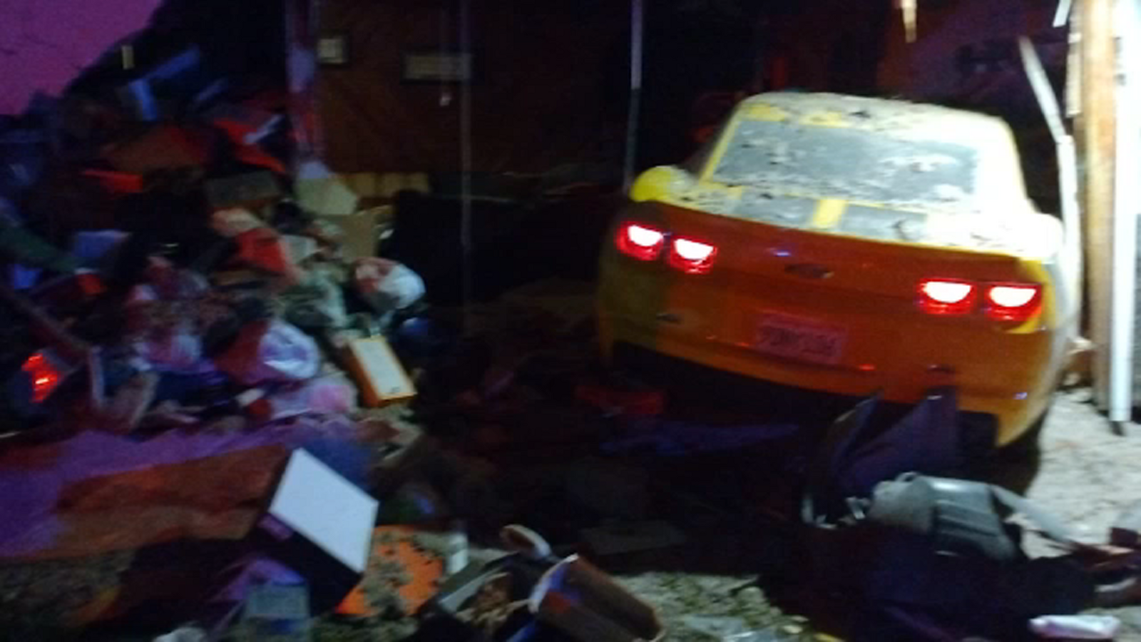 Family displaced after car crashes into central Fresno home - ABC30 Fresno
