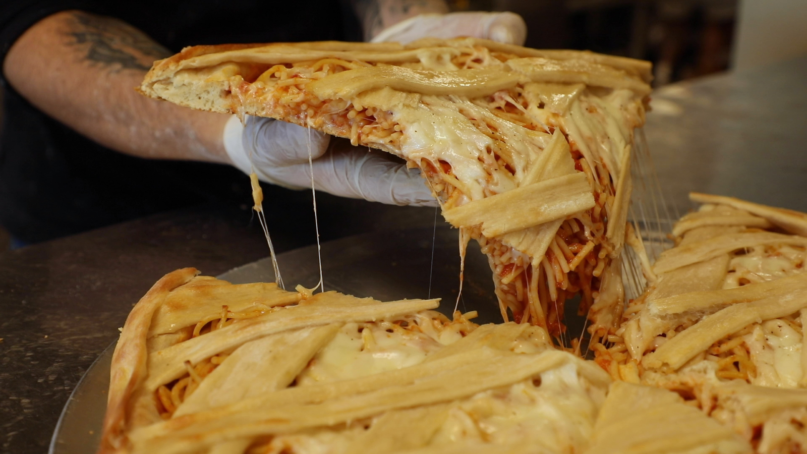 Rosa Rosa Pizzeria launches a spaghetti pizza. Would you try it? - Vimarsana News