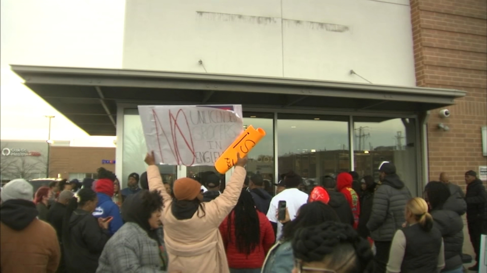 Englewood Save A Lot owners meet with protesters at preview event postpone store opening