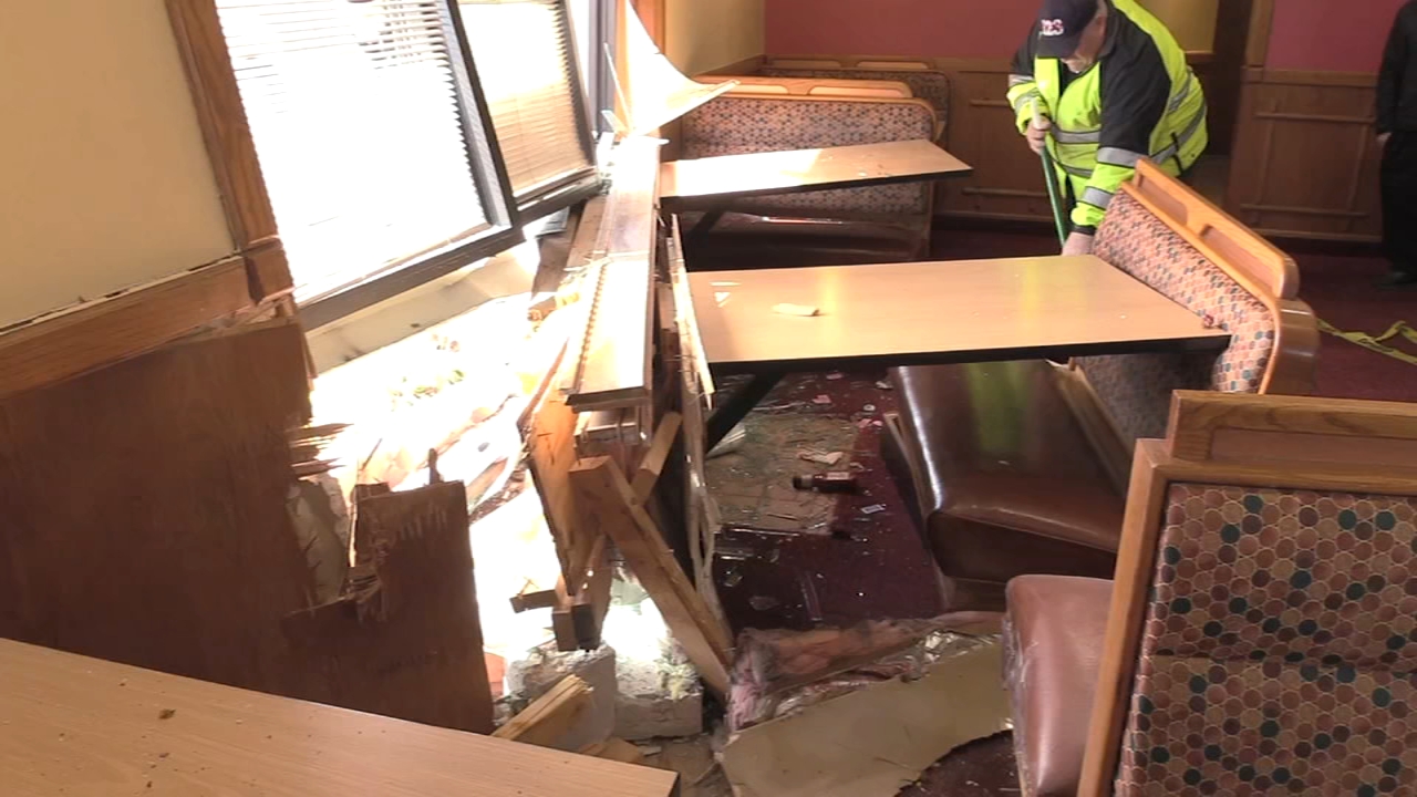 Car slams into Westmont restaurant, pinning diner under table