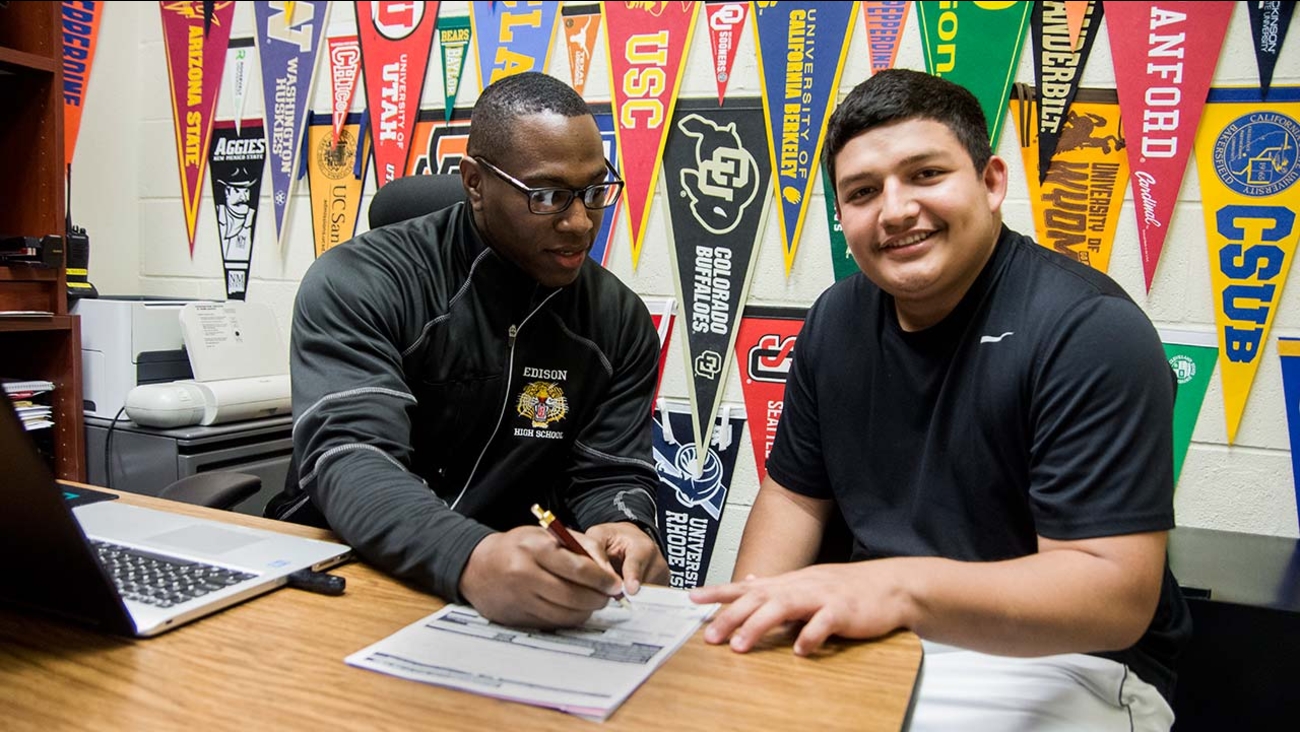 Edison High School senior Oscar Rivera, working with academic counselor Arthur Sulcer, walked 1,000 miles from his home in Honduras to the U.S.