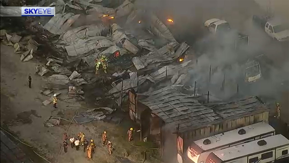 Storage warehouse destroyed in fire sparked by candles: Authorities