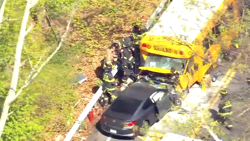 At least 9 injured in crash between school bus, car in New Castle
