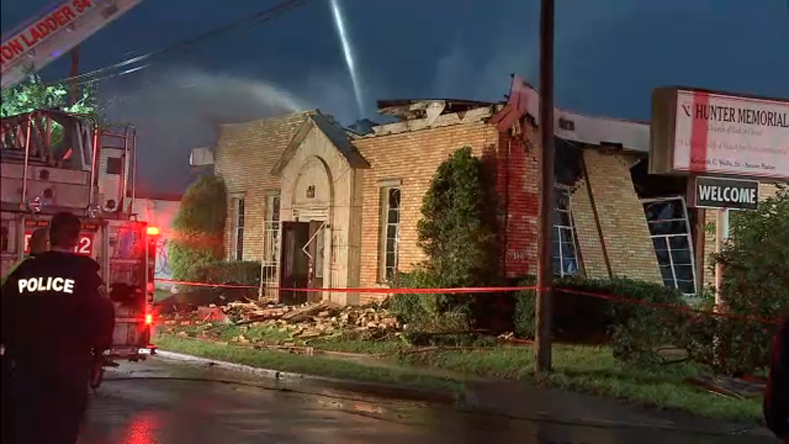 Video shows firefighter spraying water over north Houston church that collapsed in fire