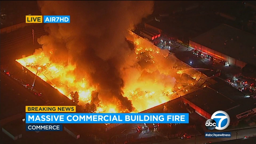 Massive fire engulfs industrial building in Commerce