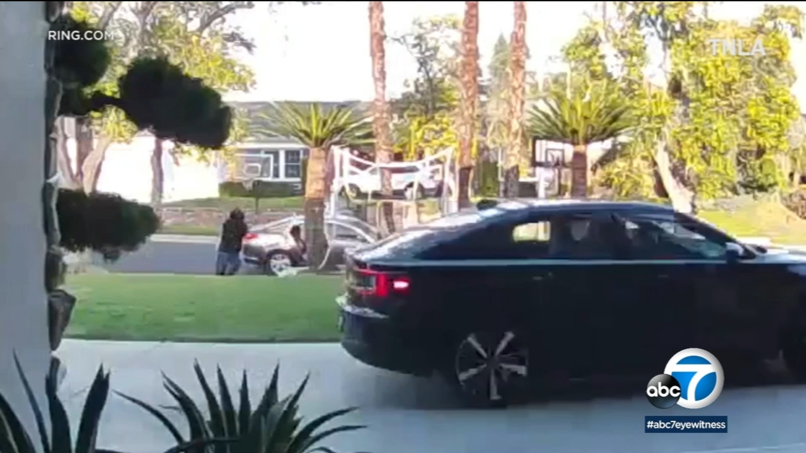 Video shows suspect try to shoot man in front of his children in Northridge driveway Video shows suspect try to shoot man in front of his children in Northridge driveway