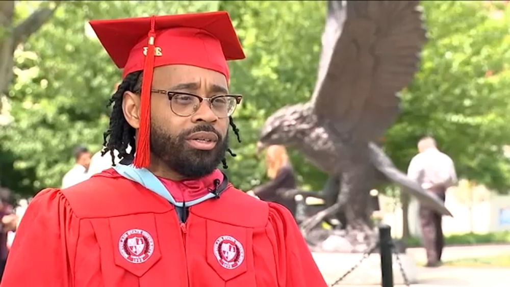 'Super-dad' who worked 3 jobs graduates with master's degree