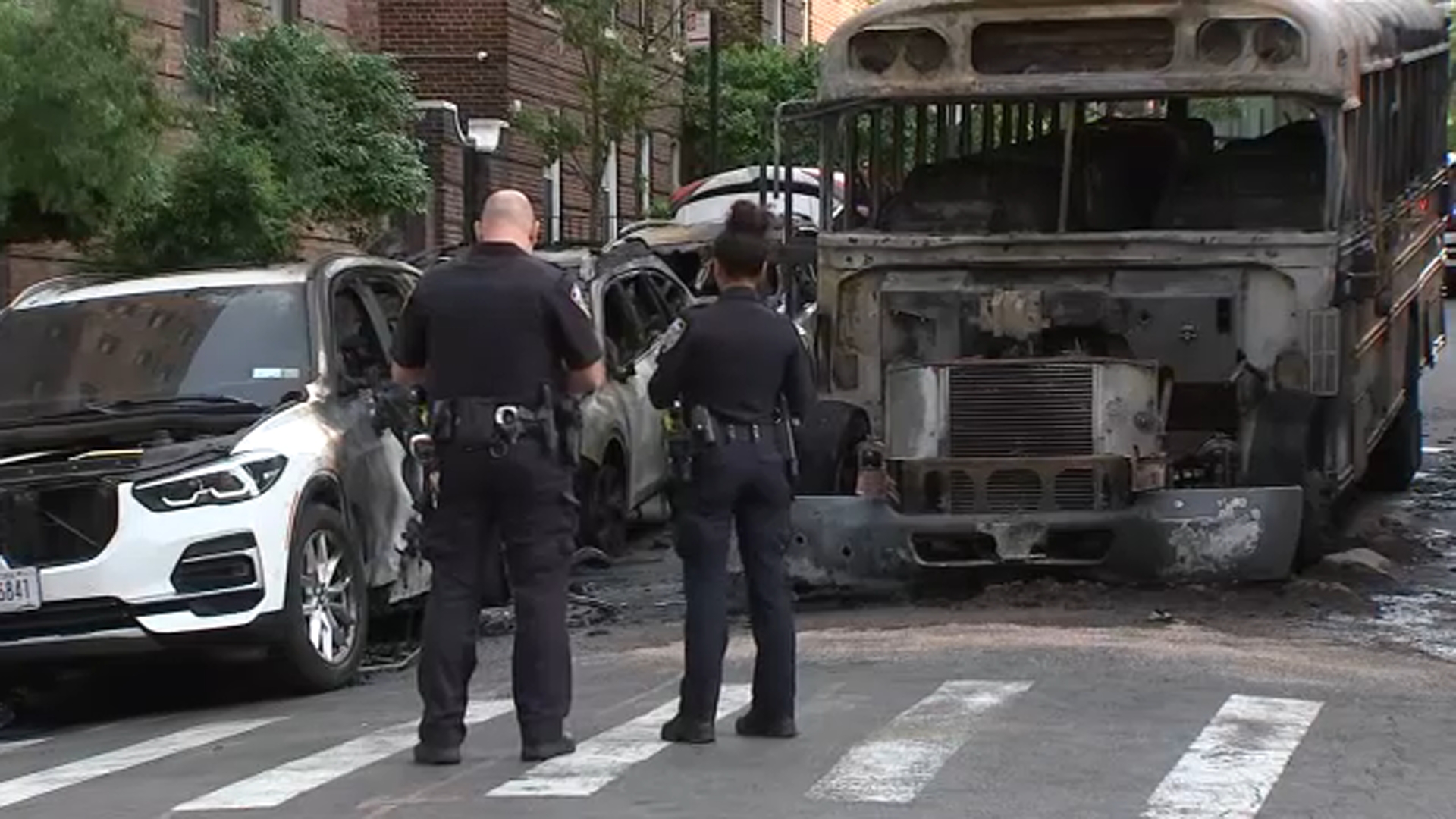 School bus, cars destroyed by fire in Queens