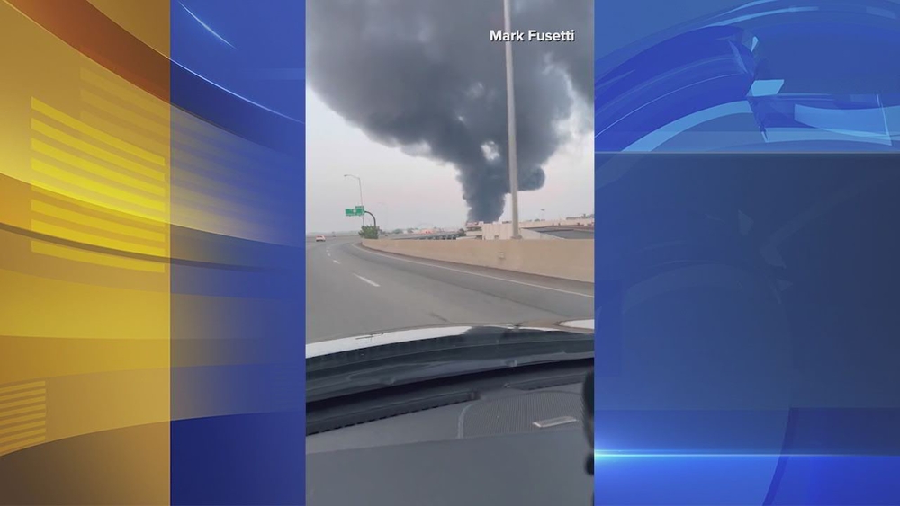 Viewer videos show fire under I-95 on Sunday morning