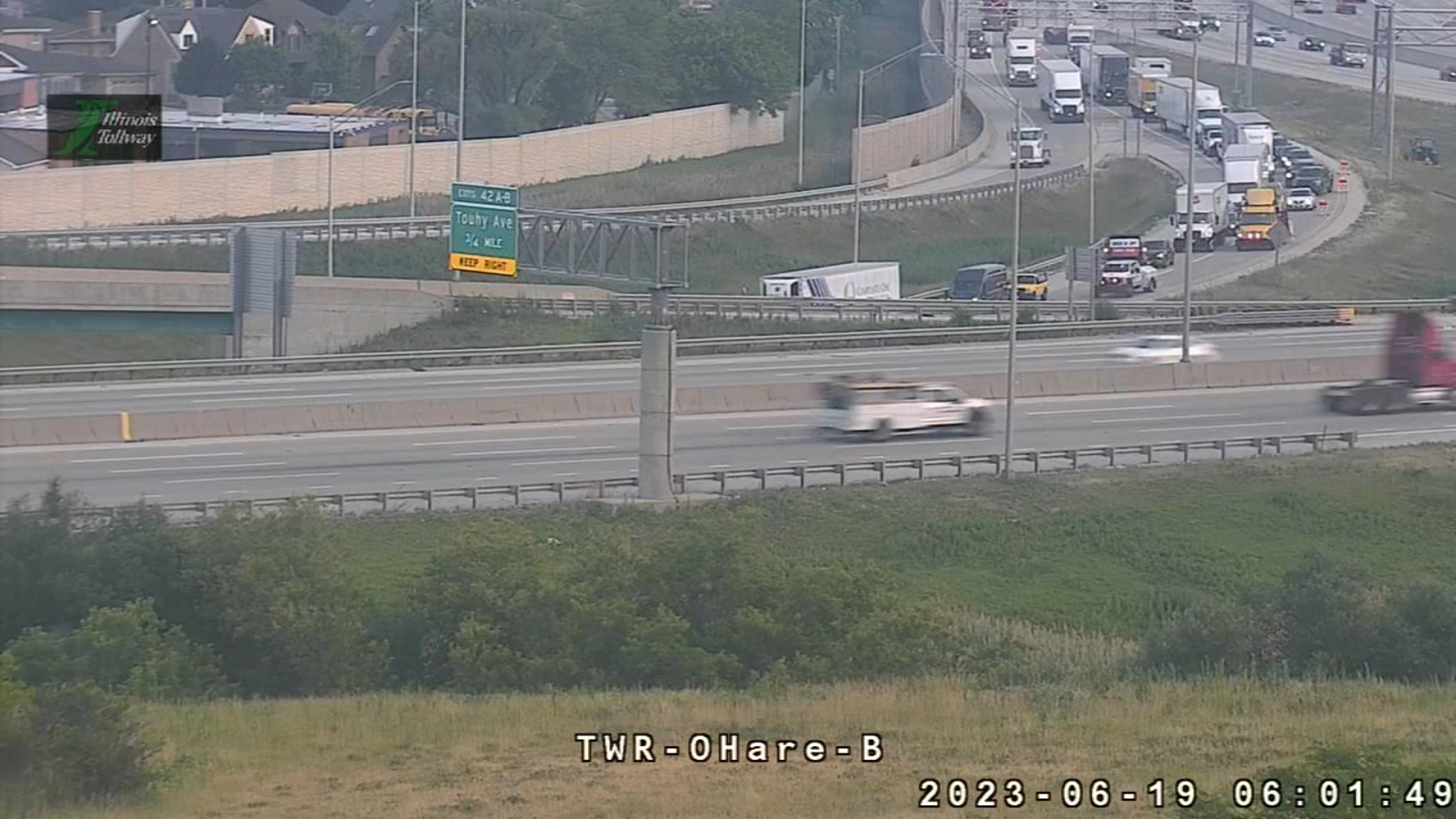 Truck carrying corrosive material rolls over on I90 ramp in Rosemont Illinois State Police