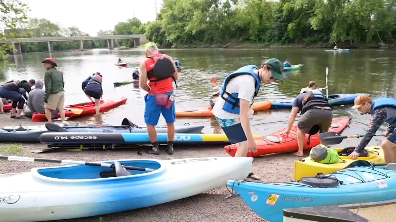 Kayakers participate in the Schuylkill River Sojourn to paddle 112 miles across water