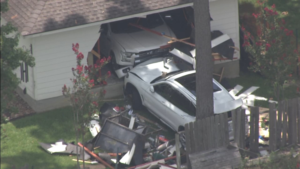 Crash into Spring-area garage pushes parked car through back wall